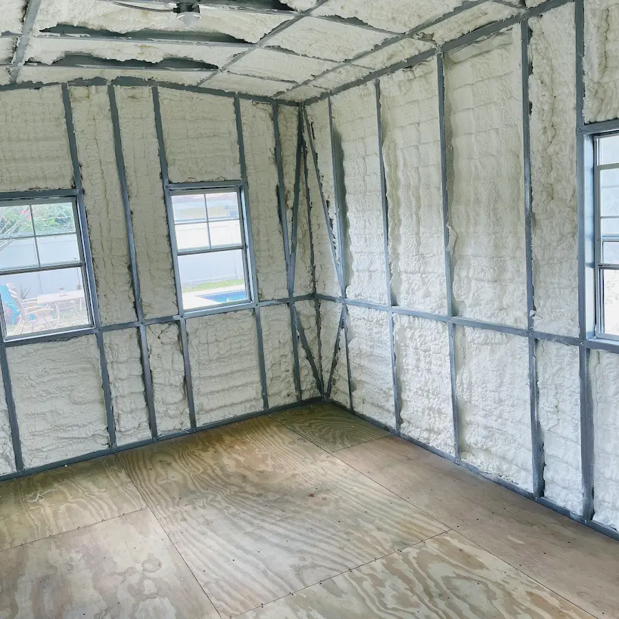 Closed-cell spray foam insulation applied to wall cavities in a residential project in Fort Bliss